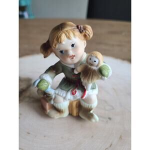 Vintage Christmas Girl Holding Baby Doll‎ Figurine Snow Green Red Sitting